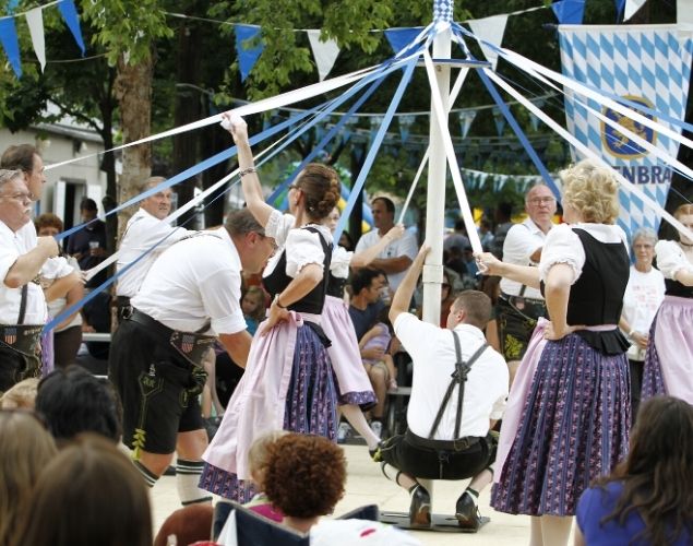 people dancing at german event